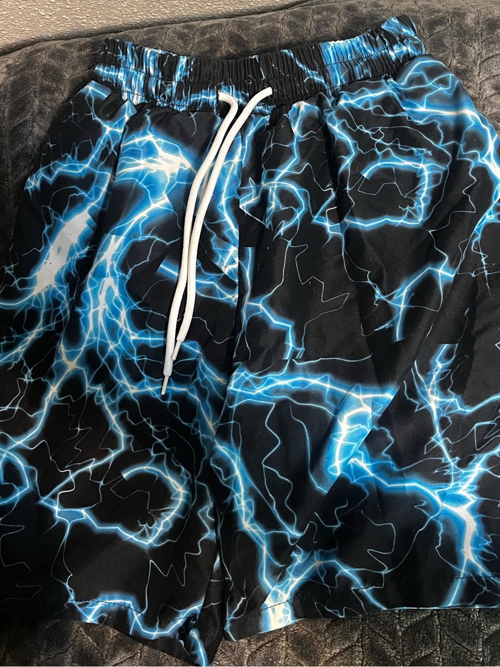 SHEIN Black Swim Trunks with Blue Lightning Print